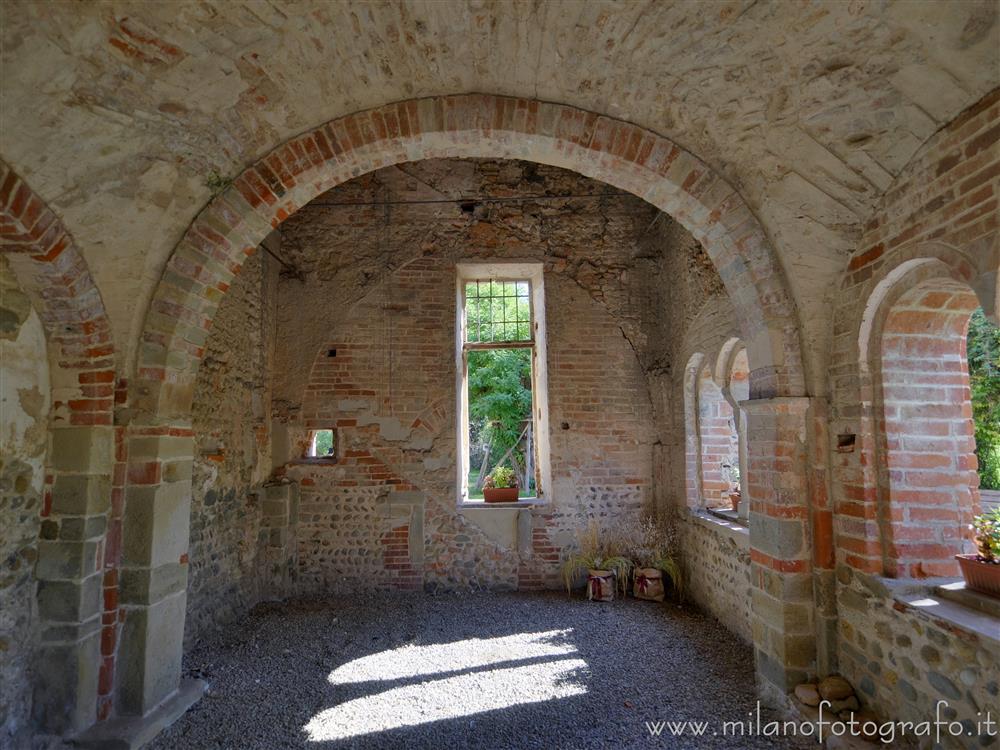 Castelletto Cervo (Biella, Italy) - Left half of the portico of the church of the Cluniac Priory of the Saints Peter and Paul